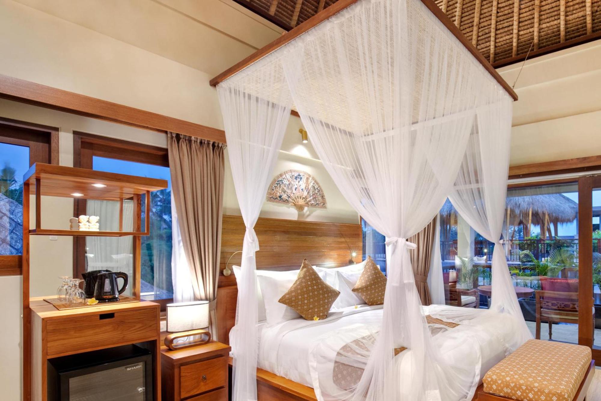 Ubud Nyuh Bali Resort & Spa Pokoj fotografie A mosquito net over a bed