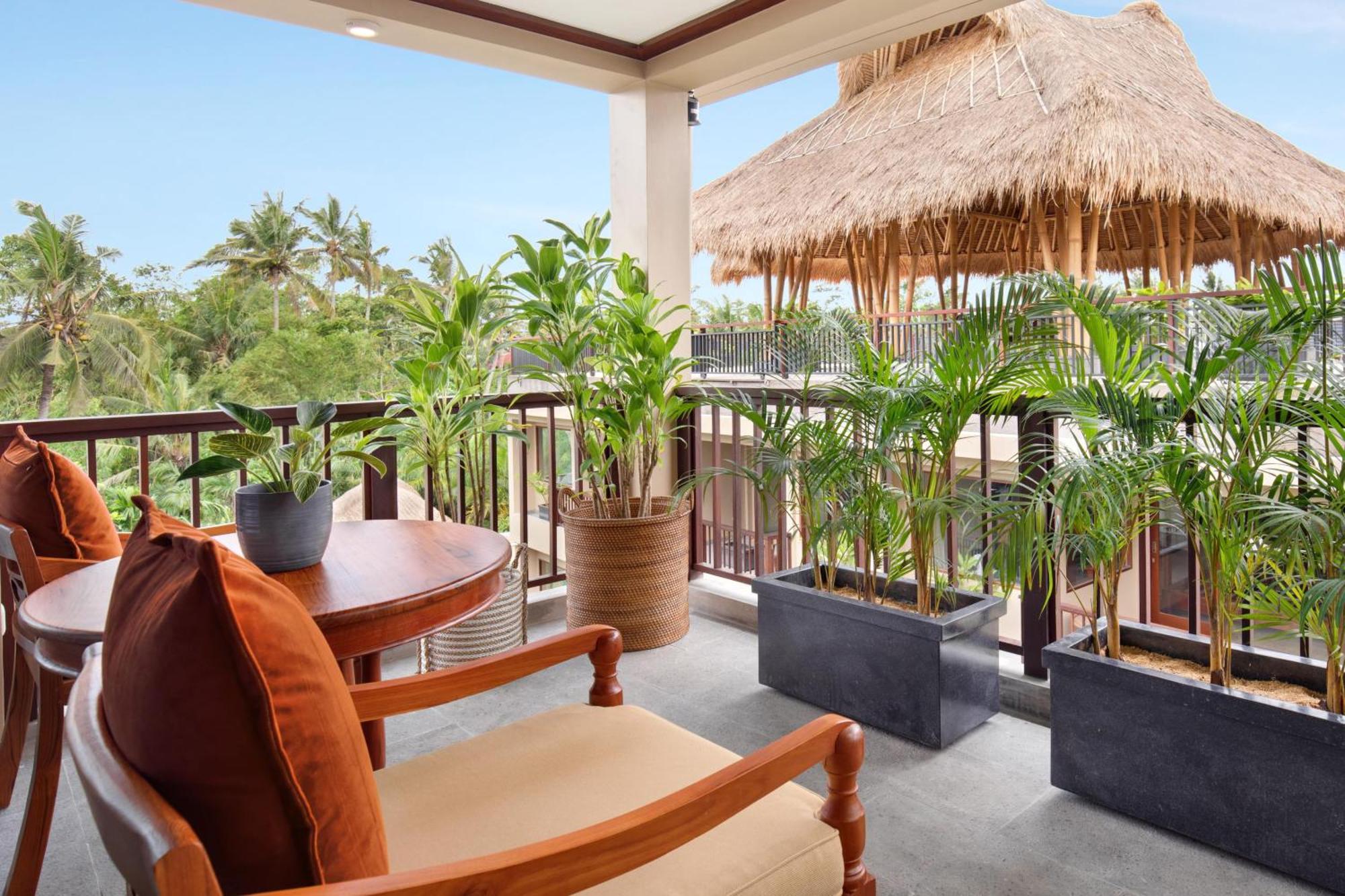 Ubud Nyuh Bali Resort & Spa Pokoj fotografie A balcony at the hotel